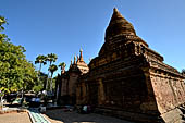 Bagan Myanmar. Next to the Gubyaukgyi stands the gilded Myazedi or 'Emerald Stupa'. 